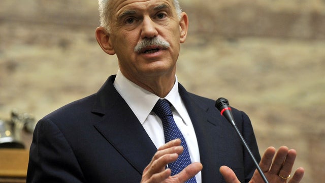 Greek Prime Minister George Papandreou speaks during a session of the Socialist party parliamentary group at the Greek Parliament in Athens Nov. 3, 2011. Papandreou said he was prepared to drop plans for a referendum on a debt bailout in the face of oppos 