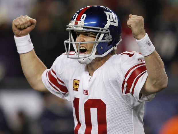 Eli Manning celebrates his touchdown pass 