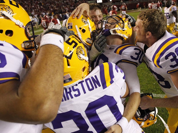 Drew Alleman is embraced by teammates 