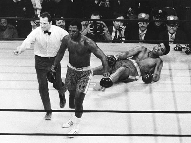 Joe Frazier knocks down Muhammad Ali 