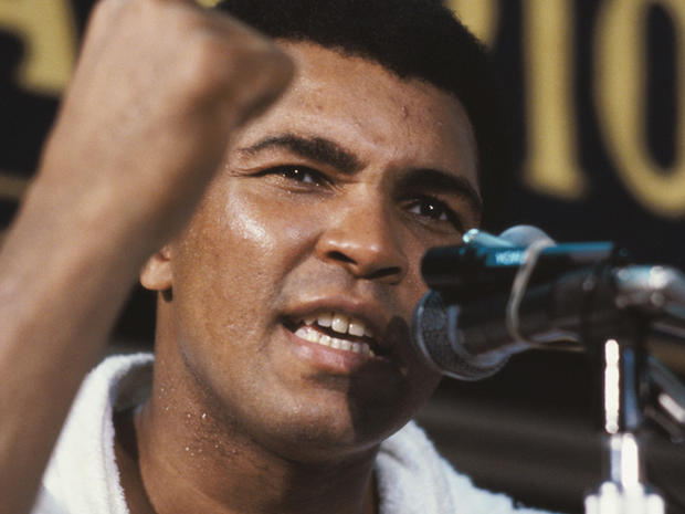 Muhammad Ali gestures at press conference 