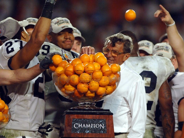 Joe Paterno with the Orange Bowl award 