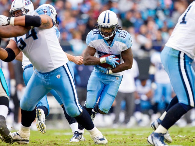 Chris Johnson takes a hand-off  