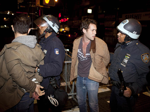 Occupy Wall Street protesters are detained by police officers 
