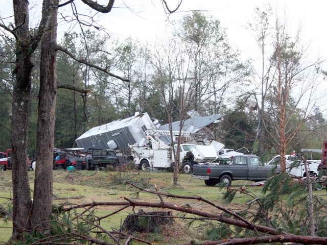 A camper rests on a building near Lowe Road  