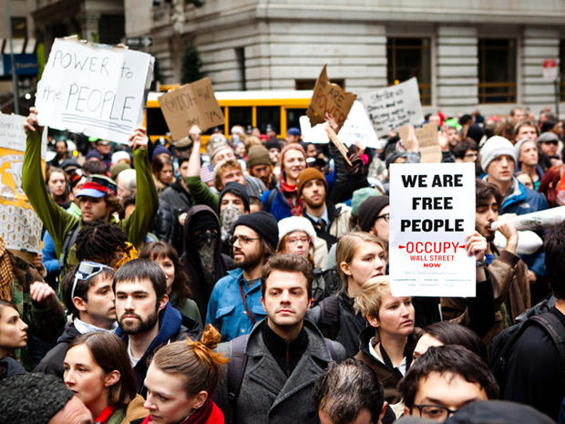 Occupy Wall Street protesters march through lower Manhattan in search for an entrance to a police-barricaded Wall Street Nov. 17, 2011, in New York. 