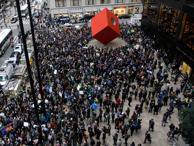 Demonstrators affiliated with the Occupy Wall Street movement assemble across the street from Zuccotti Park in lower Manhattan before marching through the streets of New York's financial district Nov. 17, 2011. 