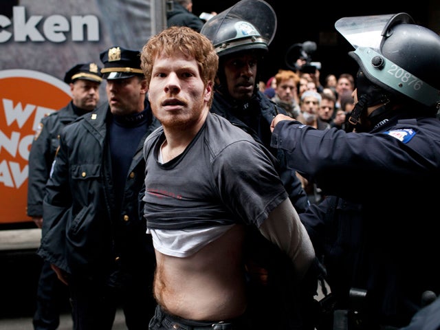 A protester is arrested 