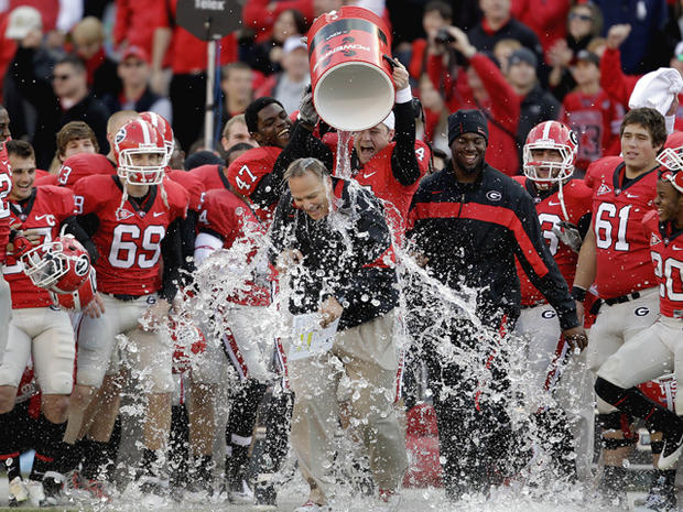 Georgia head coach Mark Richt is doused with water 
