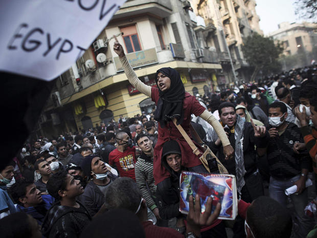 Protesters demonstrate during clashes with Egyptian riot police 