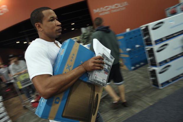 A shopper moves through a Best Buy store  