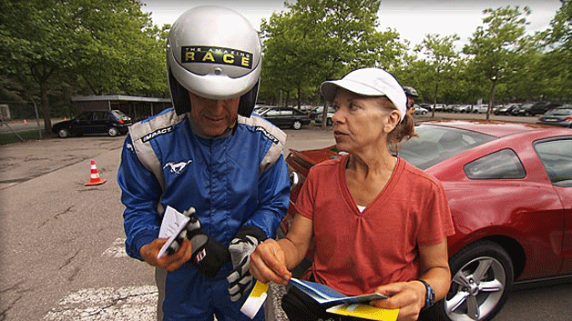 "The Amazing Race" contestants  Bill and Cathi  at the Ford Proving Grounds in Lommel, Belgium  