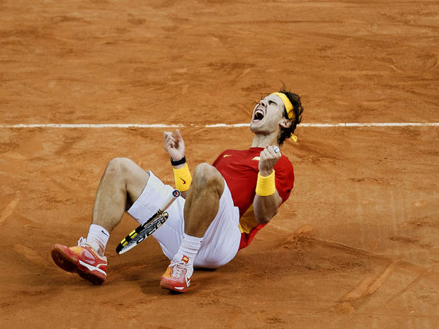 Rafael Nadal celebrates after winning his tennis 
