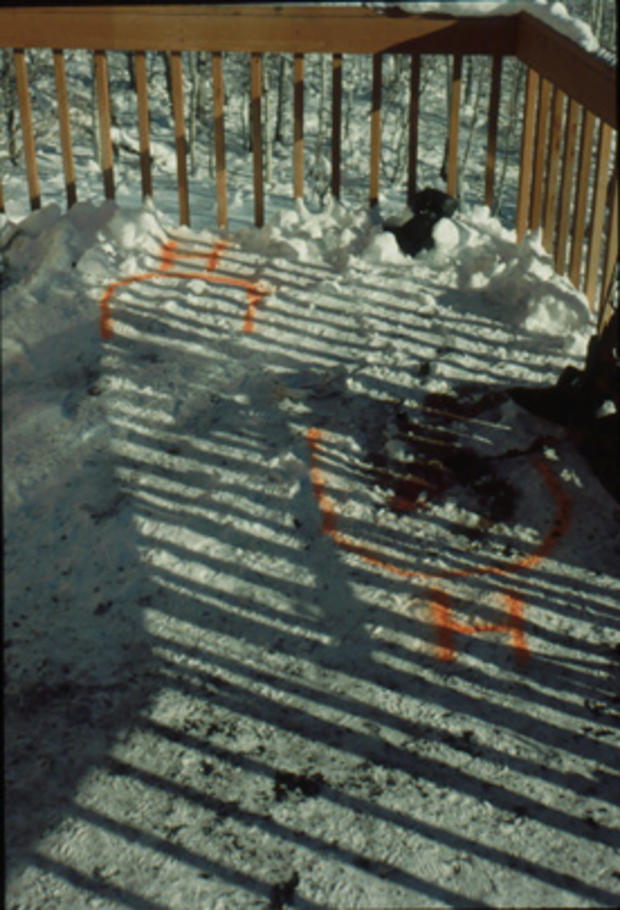 Crime scene photo of the painted outlines detailing where the victims were found 