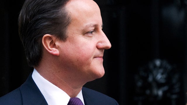 British Prime Minister David Cameron waits for the arrival of Bahrain's King Hamad bin Issa al-Khalifa at his official residence, 10 Downing Street, in London Dec. 12, 2011. 
