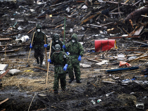 Japan Ground Self-Defense Force members search for victims 