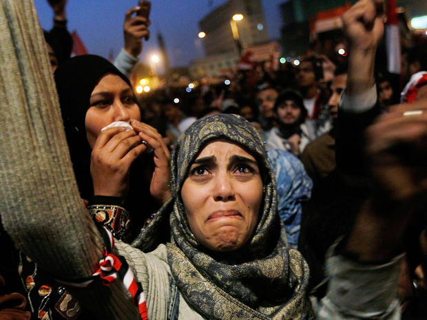 A woman cries in Tahrir Square 