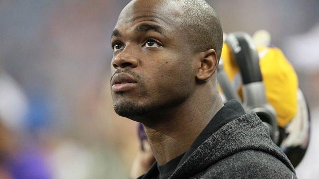 DETROIT, MI - DECEMBER 11: Adrian Peterson #28 of the Minnesota Vikings watches the action during the first half of the game against the Detroit Lions at Ford Field on December 11, 2011 in Detroit, Michigan. (Photo by Leon Halip/Getty Images)  