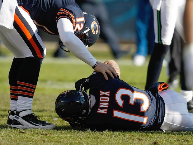 Johnny Knox lays on the field injured  