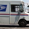 U.S. Postal Service trucks are seen parked near the loading dock at the U.S. Post Office sort center Aug. 12, 2011, in San Francisco. 