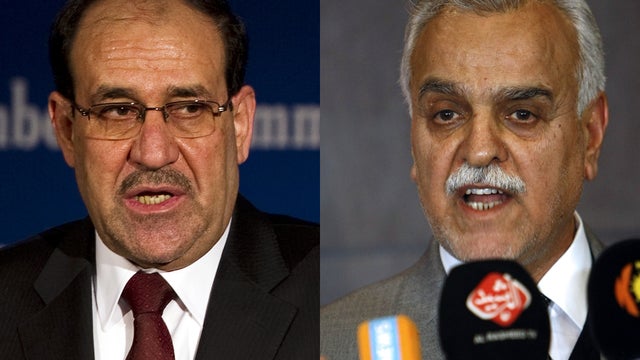 Iraqi prime minister Nouri al-Maliki, and at right, Iraqi vice president Tariq Al-Hashemi 