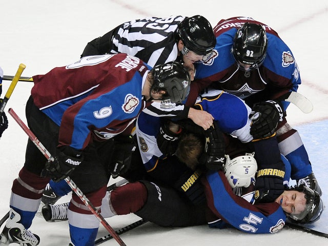 Barret Jackman tussles with Stefan Elliot 