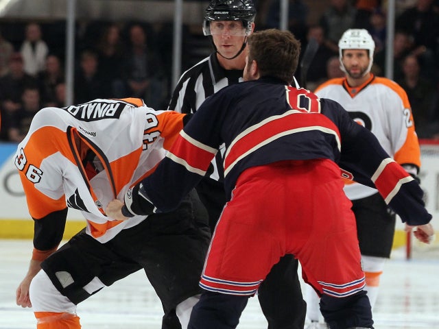 Zac Rinaldo and Brandon Prust fight just four seconds into the first period 