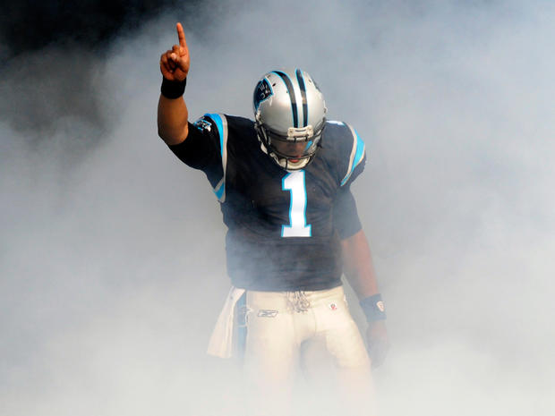 Cam Newton gestures as he is introduced  