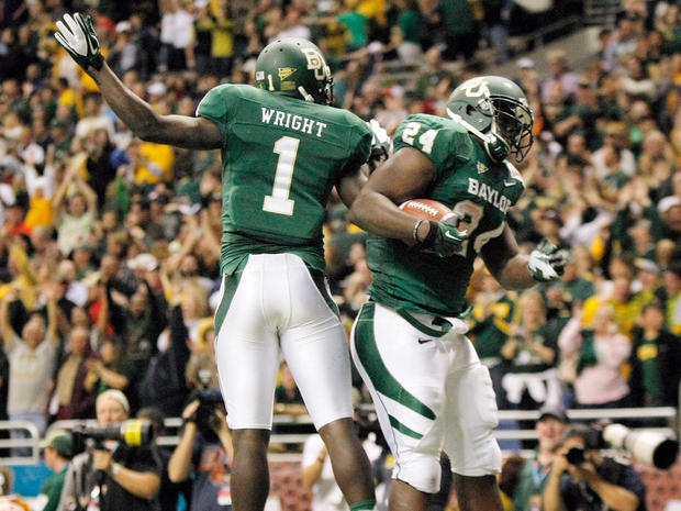 Baylor's Terrance Ganaway, right, and Kendall Wright celebrate a touchdown  