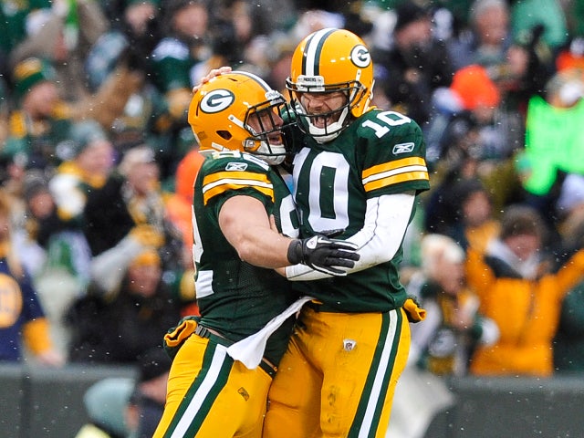 Matt Flynn celebrates with teammate Ryan Taylor, Detroit Lions 