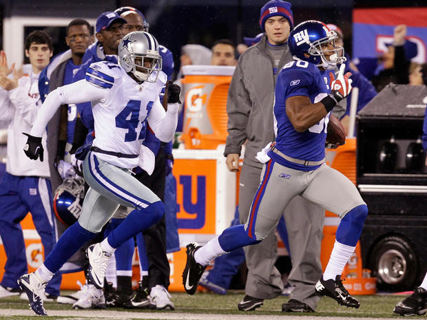 Terence Newman chases Victor Cruz  