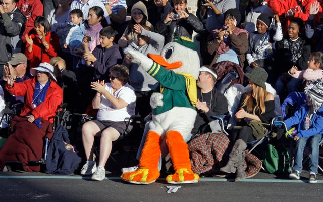 The University of Oregon Duck mascot joins paradegoers on the street in the   123rd Rose Parade in Pasadena, Calif., Monday, Jan. 2, 2012. 