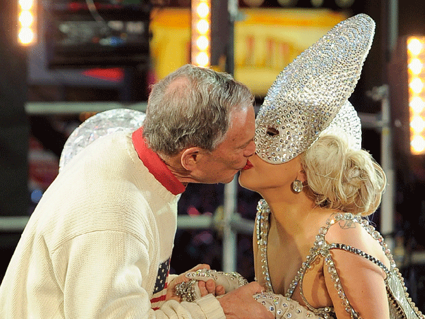 Lady Gaga and New York Mayor Michael Bloomberg share a kiss as they celebrate the beginning of 2012 in New York's Times Square.