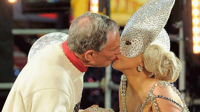 Lady Gaga and New York Mayor Michael Bloomberg share a kiss as they celebrate the beginning of 2012 in  New York's Times Square. 
