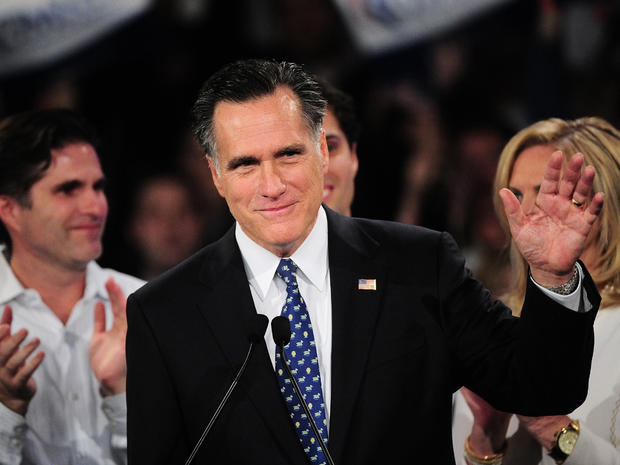 Mitt Romney addresses a primary night victory rally in New Hampshire 