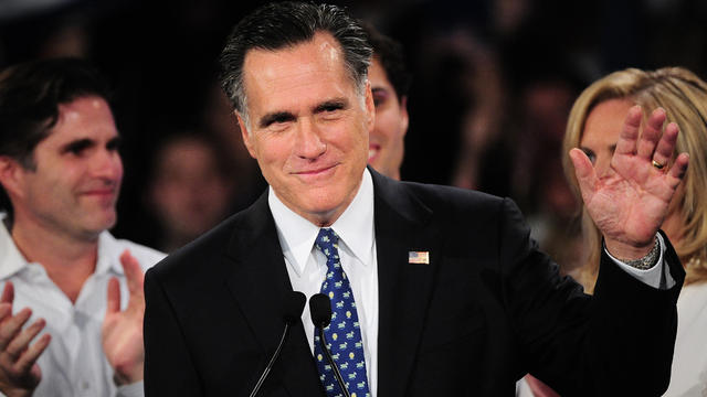 Mitt Romney addresses a primary night victory rally in New Hampshire 