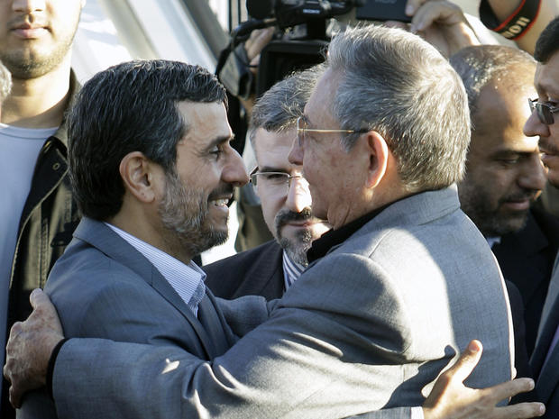 Raul Castro embraces Iran's President Mahmoud Ahmadinejad 