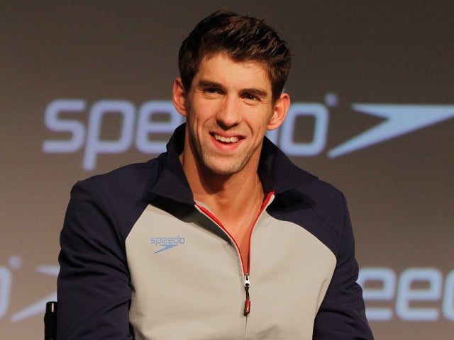 Michael Phelps speaks to the media 