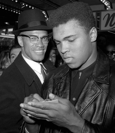 Muhammad Ali signs for Malcolm X  