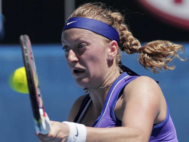 Petra Kvitova hits a forehand return 