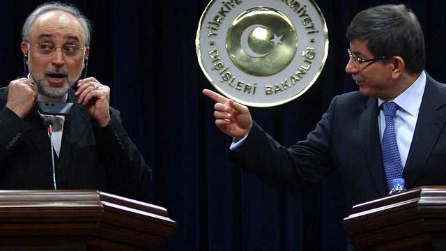Turkish Foreign Minister Ahmet Davutoglu, right, and his Iranian counterpart, Ali Akbar Salehi, speak to the media after their talks in Ankara, Turkey, Jan. 19, 2012. 