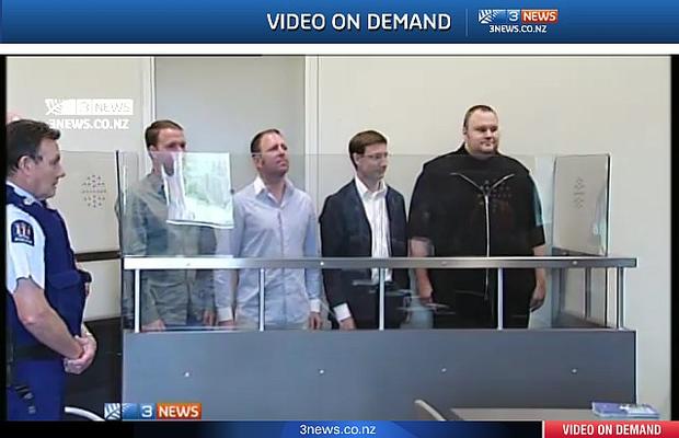 Scene from a New Zealand courtroom: Kim DotCom (at right) and others arrested January 19. 