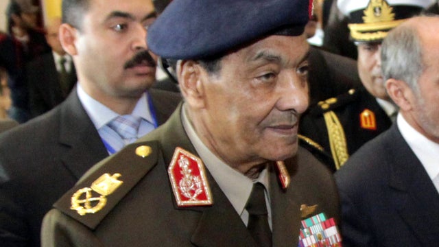 Field Marshal Mohammed Hussein Tantawi, head of Egypt's ruling military council, arrives at Tripoli's international airport in the Libyan capital Jan. 16, 2012. 