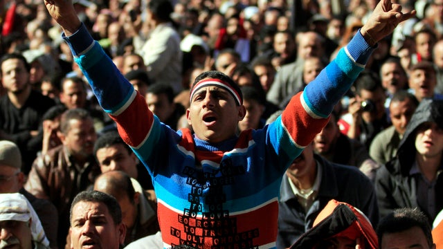 An Egyptian protester chants slogans at a rally to mark the first anniversary of the "Friday of Rage" in Cairo's Tahrir Square Jan. 27, 2012. Some 10,000 Egyptian protesters converged on the downtown square to mark the key day in the popular uprising that 