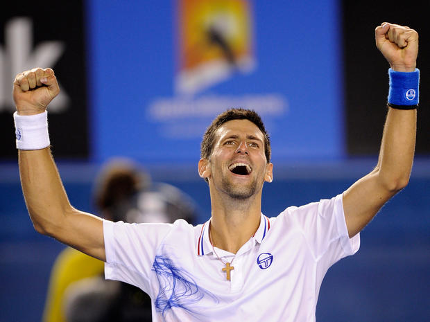 Novak Djokovic celebrates after defeating Andy Murray 