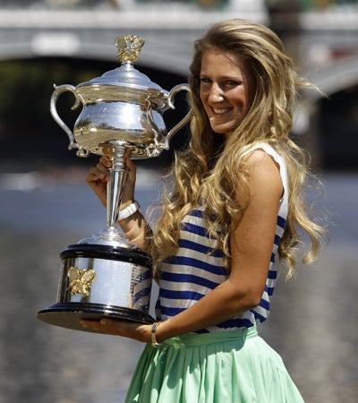 Victoria Azarenka poses with her trophy 