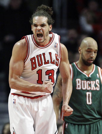 Joakim Noah reacts after scoring 