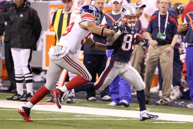 Wes Welker is pushed out of bounds after a 19 yard run 