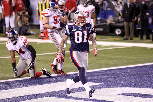 Aaron Hernandez celebrates after catching a 12 yard touchdown pass 