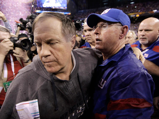  Bill Belichick  turns away after greeting Tom Coughlin  